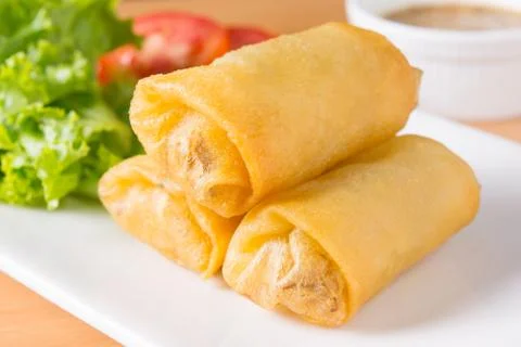 Spring rolls on white dish 스톡 사진
