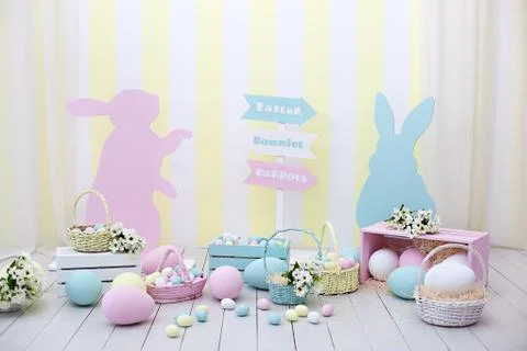 Spring room decoration and easter decor. Colorful Easter room interior. Stock Photos