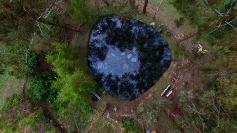 Spring, sacred lake in the middle of a eucalyptus forest Stock Footage 232702172