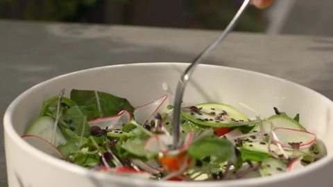 Spring salad from fresh vegetables. Close up. Stock Footage 277135664