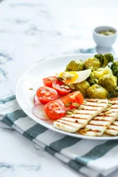 Spring salad with grilled cheese Stock Photos