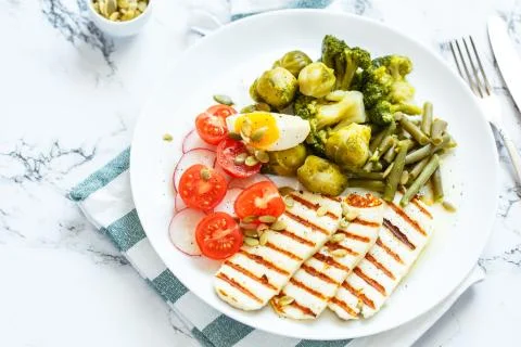 Spring salad with grilled cheese Stock Photos