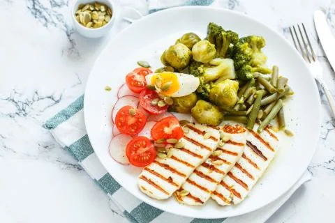 Spring salad with grilled cheese Stock Photos