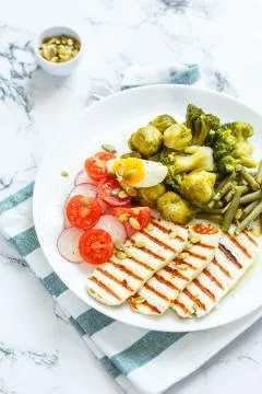 Spring salad with grilled cheese Stock Photos