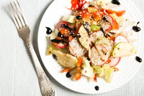 Spring salad with radish and celery Stock Photos