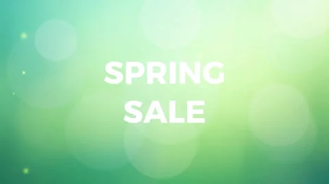 Spring sale text swirls on green background with sparkles and bokeh effect Stock Footage 299565149