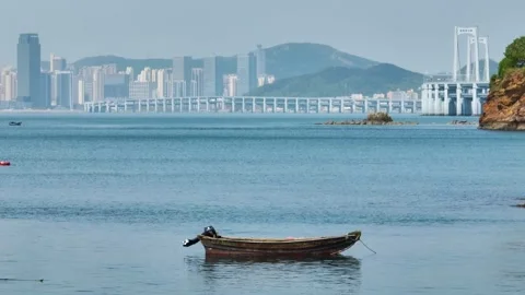 Spring seaside scenery of Binhai Road in Dalian, Liaoning province, China Stockbeeldmateriaal 241405393