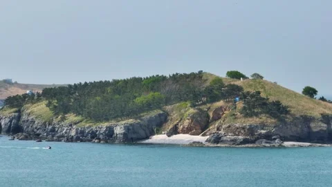 Spring seaside scenery of Binhai Road in Dalian, Liaoning province, China Stockbeeldmateriaal 241405575