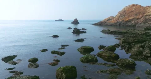 Spring seaside scenery of Binhai Road in Dalian, Liaoning province, China Stock Footage 241406179