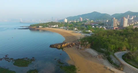 Spring seaside scenery of Binhai Road in Dalian, Liaoning province, China Stock Footage 241406973
