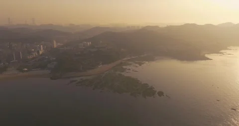 Spring seaside scenery of Binhai Road in Dalian, Liaoning province, China Stockbeeldmateriaal 241407351