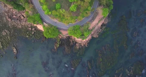 Spring seaside scenery of Binhai Road in Dalian, Liaoning province, China Stock Footage 241407994