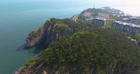 Spring seaside scenery of Binhai Road in Dalian, Liaoning province, China Stock Footage 241409796