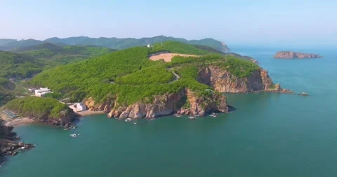 Spring seaside scenery of Binhai Road in Dalian, Liaoning province, China Stock Footage 241410139