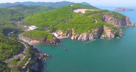 Spring seaside scenery of Binhai Road in Dalian, Liaoning province, China Stock Footage 241410208