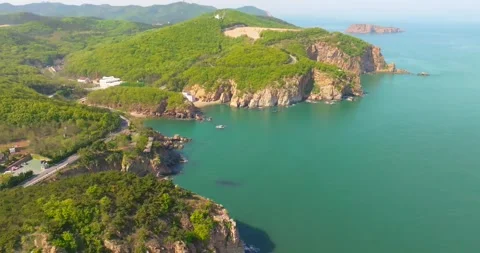 Spring seaside scenery of Binhai Road in Dalian, Liaoning province, China Stock Footage 241410284