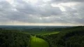 Spring season landscape aerial timelapse green corn fields village and clouds 4k or 4k+ Resolution