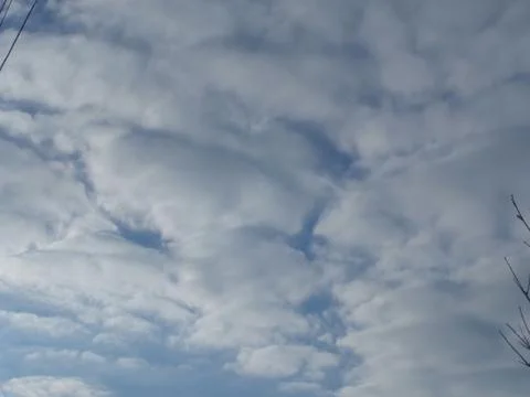 Spring sky with white clouds Stock Photos