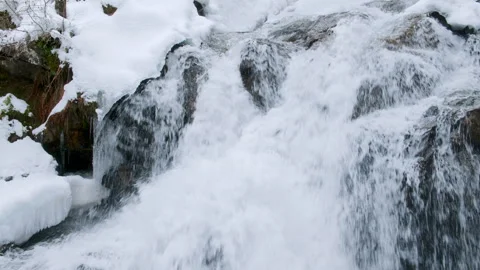 Spring Snow Melt Cascading Over Rocks at Deception Falls Stock Footage 304969353