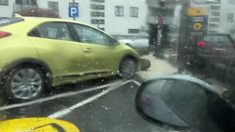 Spring snow melting on a car windshield, Legionowo Stock Footage 306300345