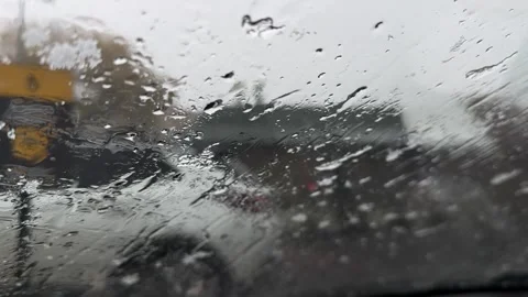 Spring snow melting on a car windshield, Legionowo Stock Footage 306300346