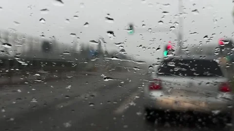 Spring snow melting on a car windshield, Legionowo Stock Footage 306300353