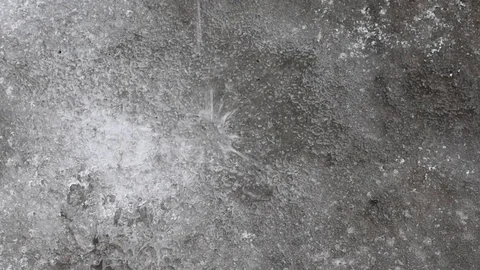 In the spring, the snow melts into water, forming pools with splashes. Stock Footage 111499766