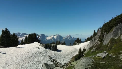 Spring snow in the mountains Stock Footage 289477174
