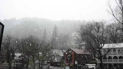 Spring snow over the North Yuba River in Downieville, California Stock Footage 152585083