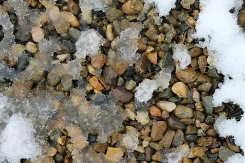 Spring snow on the rocks. snow patterns, textured Stock Photos