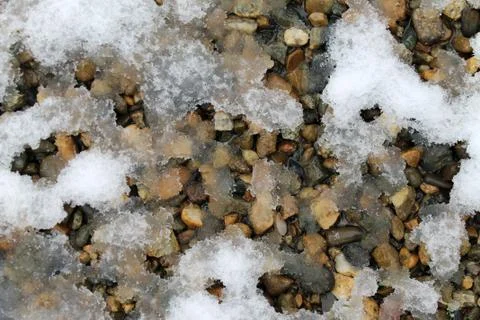 Spring snow on the rocks. snow patterns, textured Stock Photos
