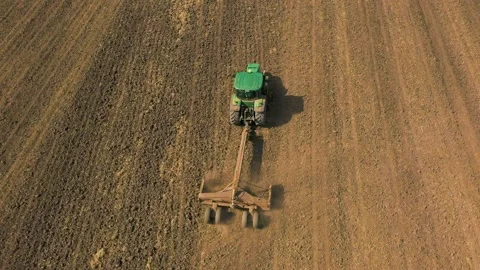 Spring Soil Preparation for Rice Sowing Stock Footage 223765459