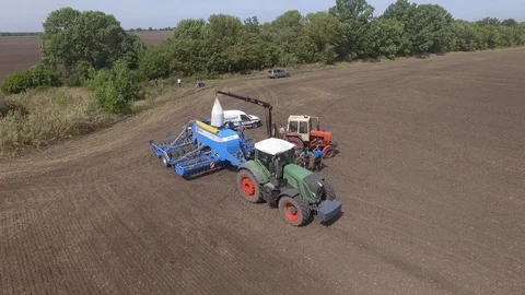 Spring sowing tractor Fendt 936 processed agricultural land Video stock 114500319