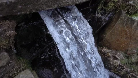 Spring spouting out of a rock, clear water, summer, rill  source of ecologica 스톡 동영상 87450486