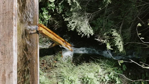 Spring, stream with water from mountain rivers on a hiking route. Outdoor recrea Stock Footage 278315649