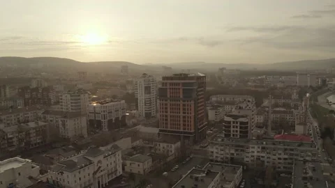 Spring sunset in the city with mountain views, Novorossiysk, Aerial 動画素材 152568896