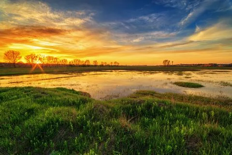 Spring Sunset Over Flooded Meadows Stock Photos