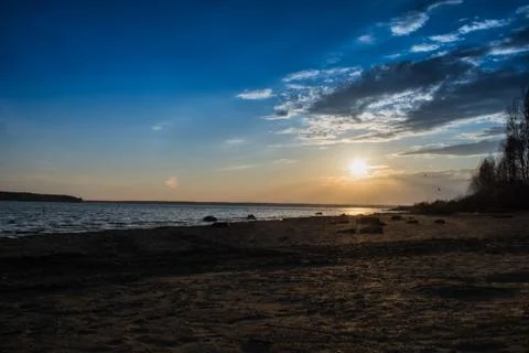 Spring sunset on the river Stock Photos