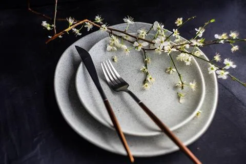  Spring table setting with blooming tree branch Spring table setting with ... Stock Photos