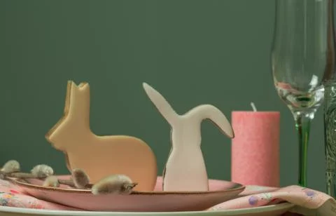 Spring table setting for Easter in pink and green. Stock Photos