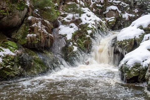 Spring thaw. Water rapids in the spring season when ice and snow melt. Stock Photos