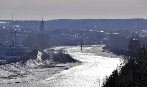 Spring thawed patches in the fields, the Sylva river is slowly freed from ice Stock Photos