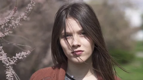 Spring Time, Beautiful young Woman Closeup Outdoors in the Park, Slow motion  Stock Footage 106598997