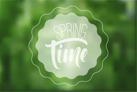 Spring time calligraphic sign on blurred green backgroung. Emblem. Illustrazione stock