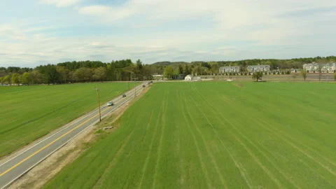 Spring Time Farm Field and Road Aerial Tracking Vidéo 153484671