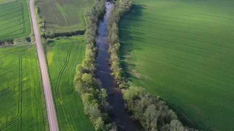 Spring time river and farmland fields, aerial Stock Footage 139670474