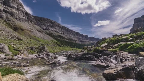Spring Timelapse Over the River in Ordesa Valley with Lush Green Landscapes Stock Footage 307219484