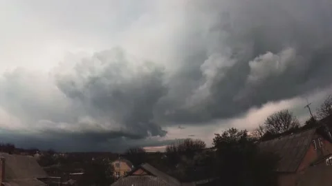 Spring timelapse thunderclouds in the village Stock Footage 131734283