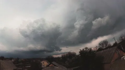 Spring timelapse thunderclouds in the village Stock Footage 131734364