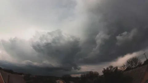 Spring timelapse thunderclouds in the village Stock Footage 131734423